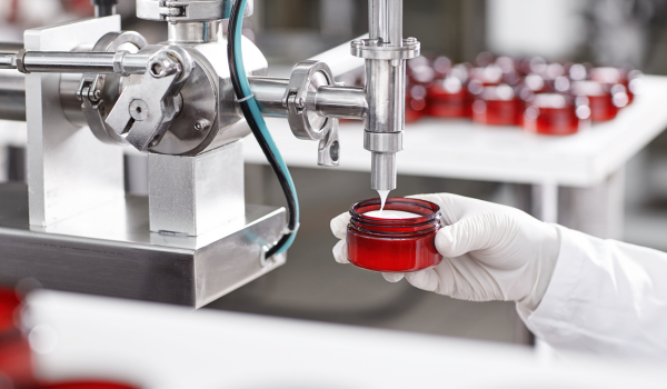 ayurvedic third party manufacturing process showing ayurvedic product filling in GMP facility